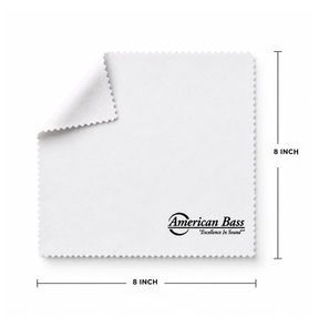 The American Bass Multipurpose Cleaning Cloth - 8″ x 8″ by American Bass Audio is a white microfiber cloth with a corner flipped up. This versatile cleaning cloth features the American Bass logo and the phrase “Excellence in Sound” printed in black text on the bottom right corner.