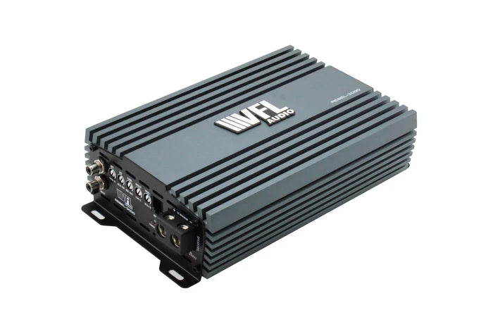 A gray American Bass Audio VFL Rebel REBEL-3000.1 monoblock amplifier with ridged sides, input/output ports, and the VFL Audio logo on top is shown angled on a white background. Ideal for powering an entry-level subwoofer bundle or the Ground Pound Bundle featuring two DX 12" subwoofers.