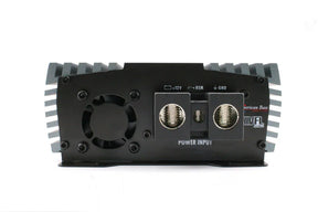 A close-up of the American Bass Audio VFL Rebel REBEL-3000.1 amplifier’s back panel reveals power input terminals labeled 12V, REM, and GND, along with a fan vent and distinct branding, flanked by black and silver heat sinks—an ideal match for driving the Ground Pound Bundle’s dual DX 12" subwoofers.